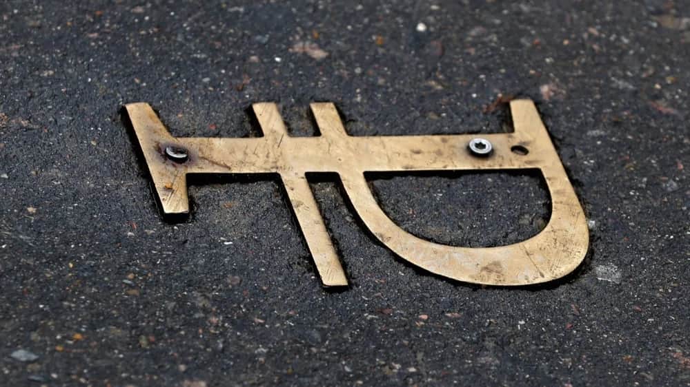 A Russian Ruble currency symbol on a sidewalk next to the Lanta Bank office in Moscow, Russia, 24 October 2023. EPA-EFE/MAXIM SHIPENKOV