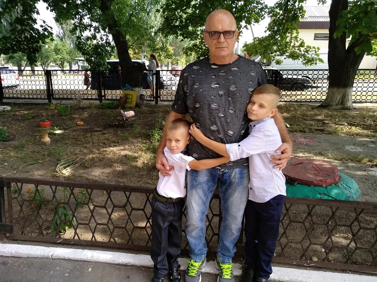 Volodymyr with his sons. Photo from the personal archive