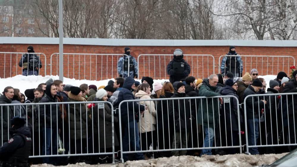 People gathered to pay their respects to Alexey Navalny during his funeral on Friday. Photo: EPA-EFE/SERGEI ILNITSKY