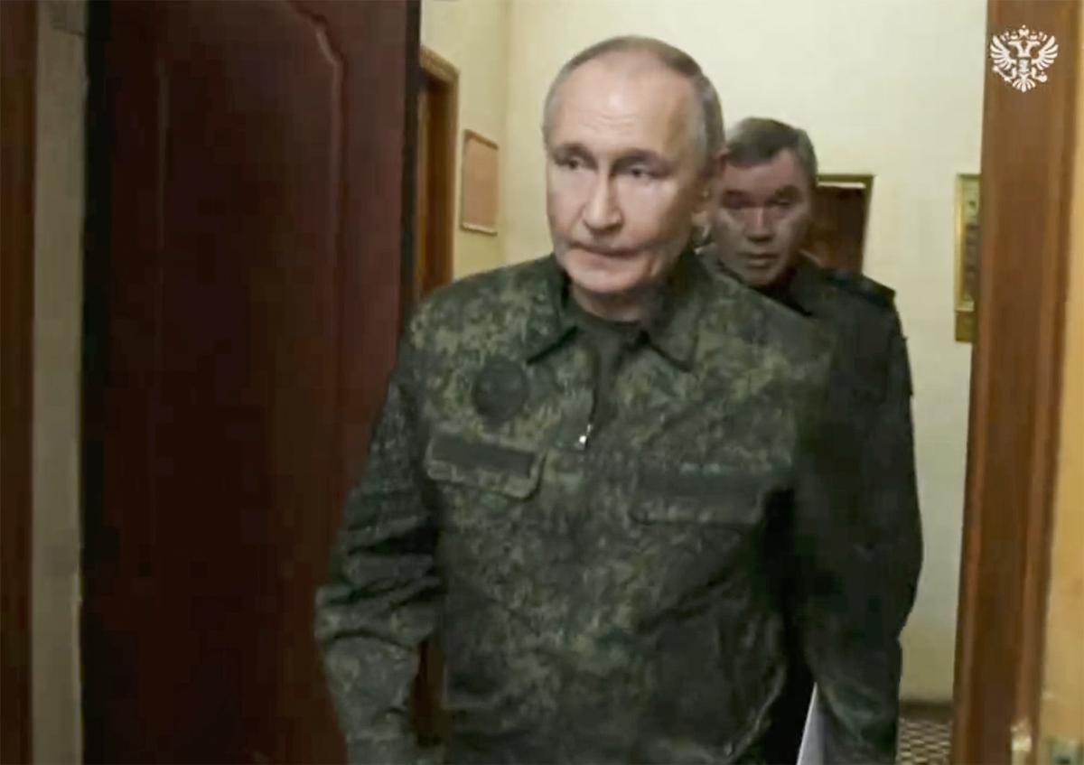 A still from footage of Vladimir Putin accompanied by Russian Chief of the General Staff Valery Gerasimov during a visit to a command post in Russia’s Kursk region, 12 March 2025. Photo: EPA-EFE